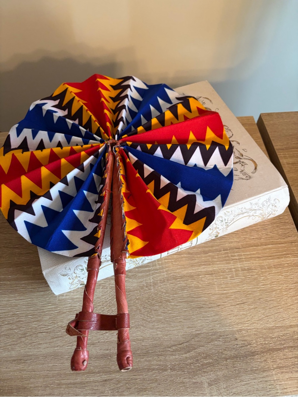 Handheld Foldable Fan with Bold Red, Blue & Yellow Geometric Print - Picture 2 of 3